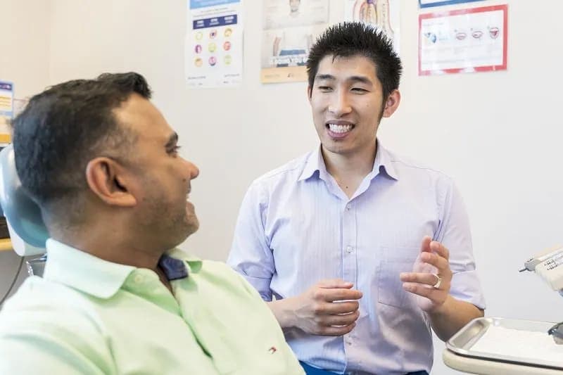 A doctor engaging with a patient